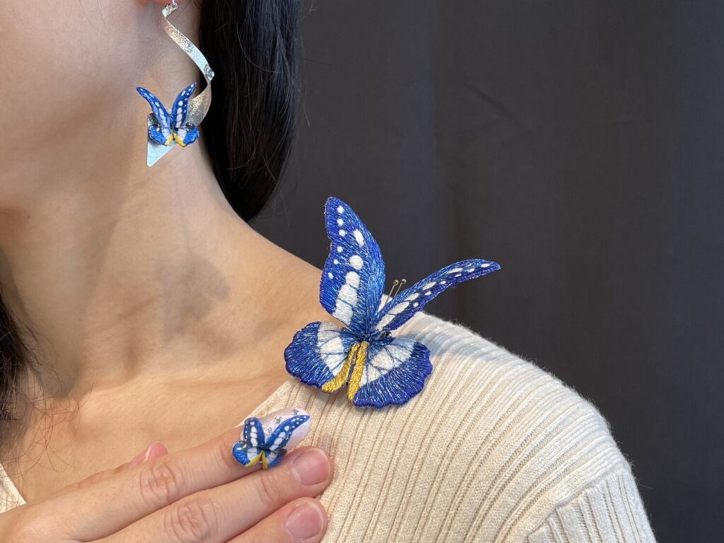 Morpho rhetenor helena butterfly brooch, spiral earrings and fake nail